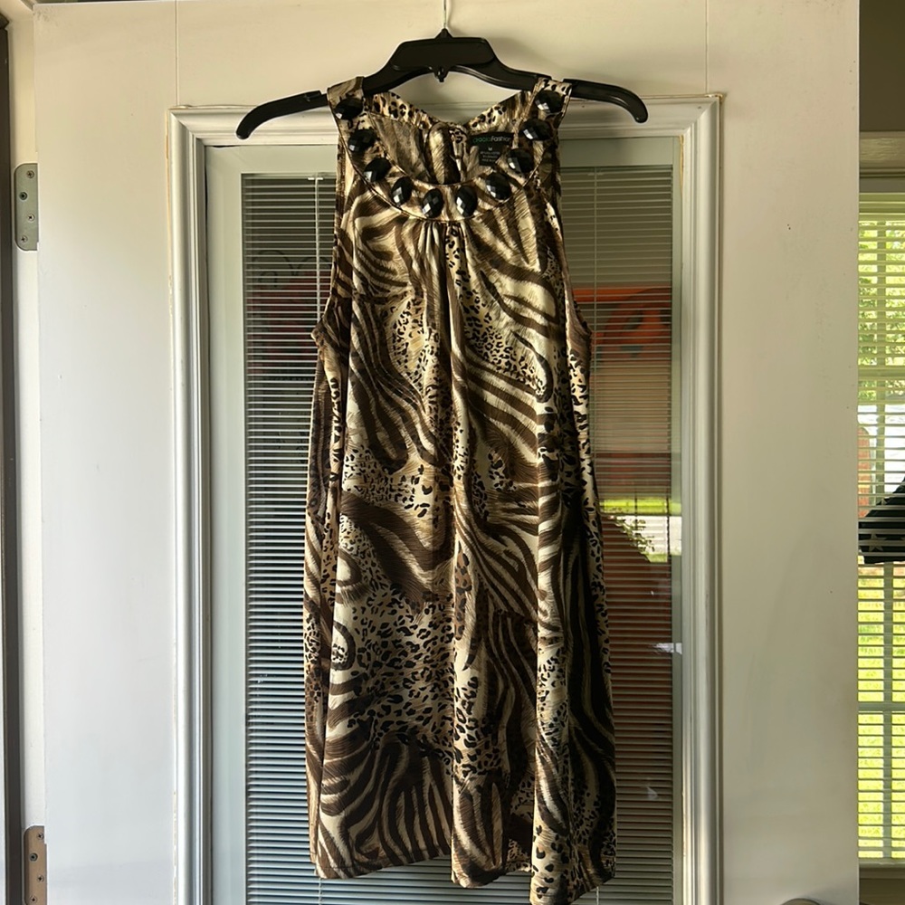 Silky animal print with jeweled crewneck with a tie, neck and keyhole back